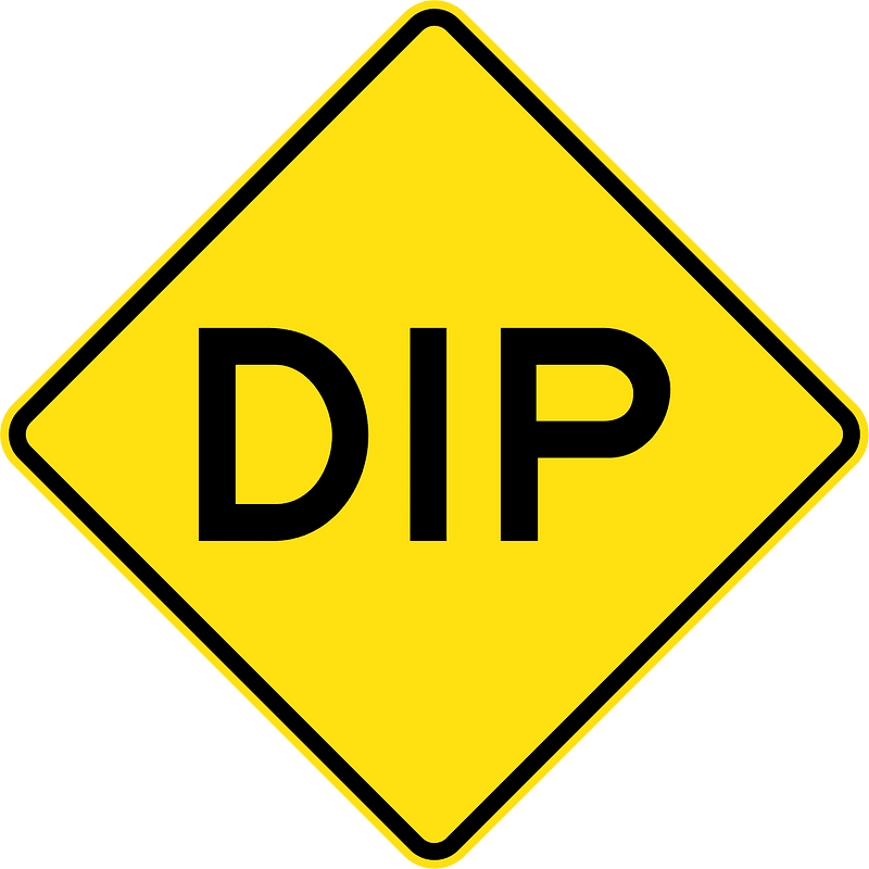 Dip in road sign in Australia