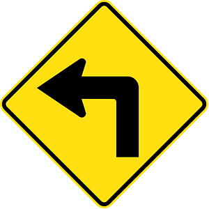 Sharp curve ahead sign in Australia