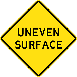 Uneven surface sign in Australia