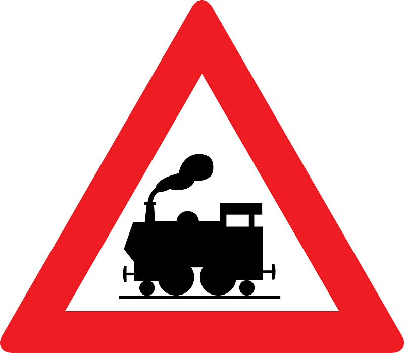 Level crossing without barriers ahead sign in Austria