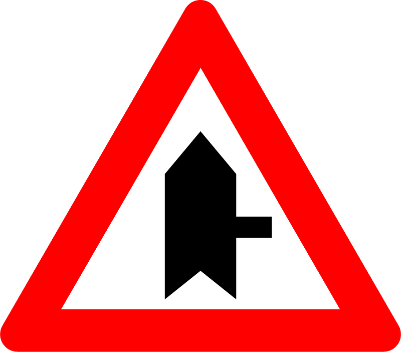 Junction with a minor road sign in Belgium