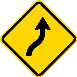 Double gentle curve ahead sign in Brazil
