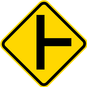 Junction with a side road ahead sign in Brazil