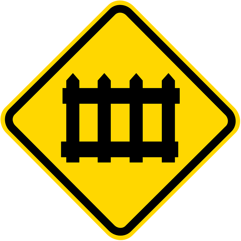 Level railroad crossing with barriers ahead sign in Brazil