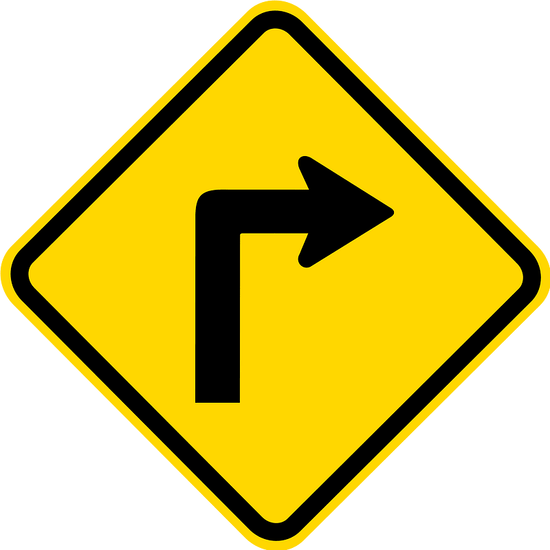 Sharp curve ahead sign in Brazil