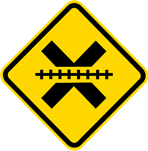 Uncontrolled railroad crossing ahead sign in Brazil