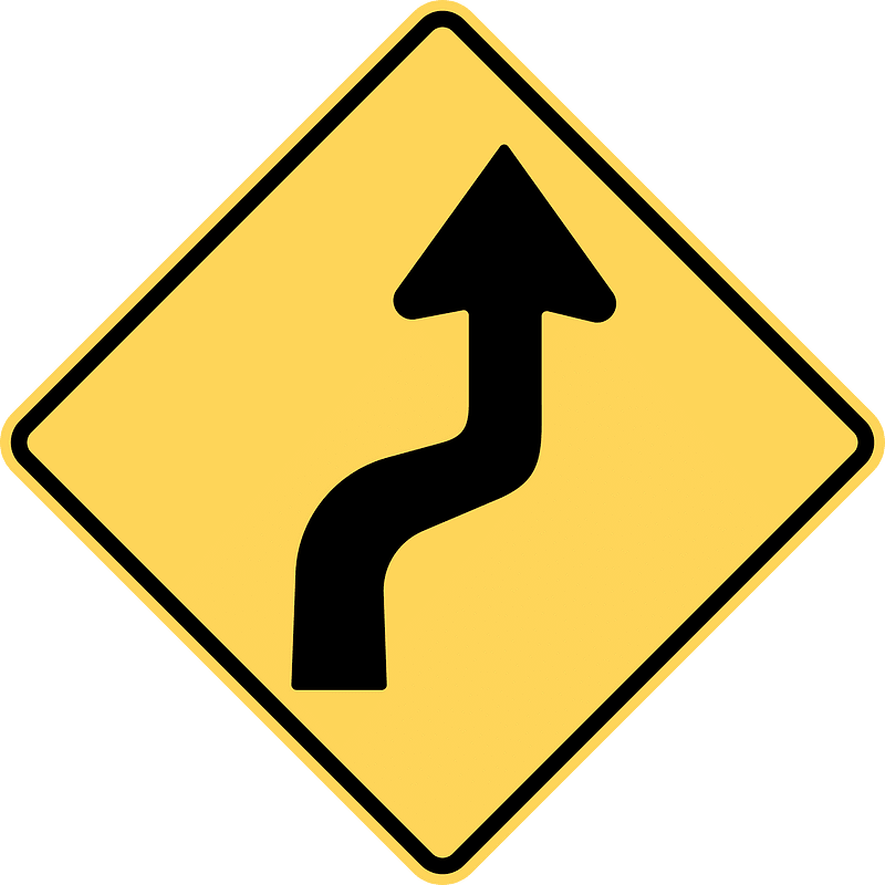 Double sharp curve ahead sign in British Columbia