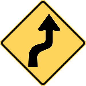 Double sharp curve ahead sign in British Columbia