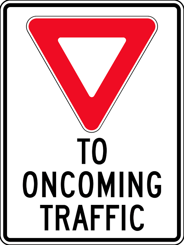Yield to oncoming traffic sign in British Columbia