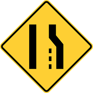 Lane ends ahead sign in Canada