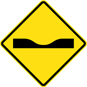 Dip in road sign in Chile