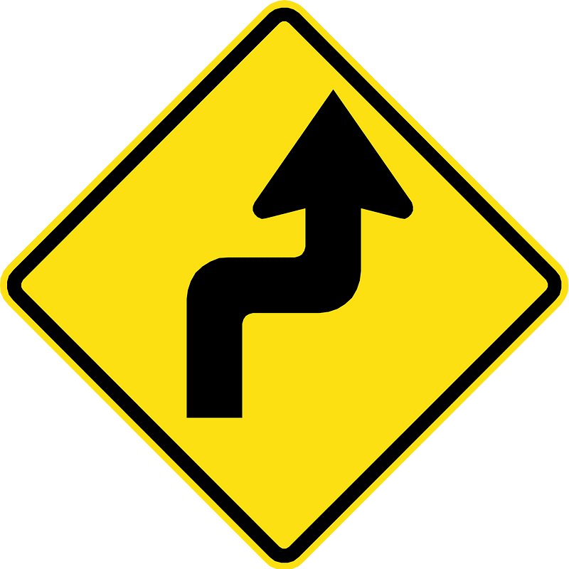 Double sharp curve ahead sign in Chile