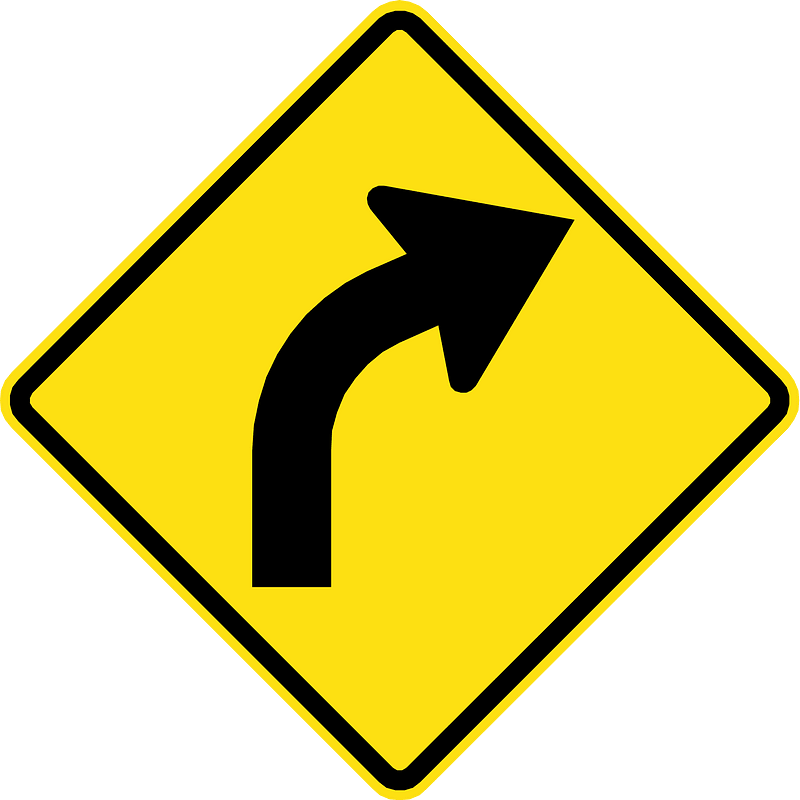 Gentle curve ahead sign in Chile