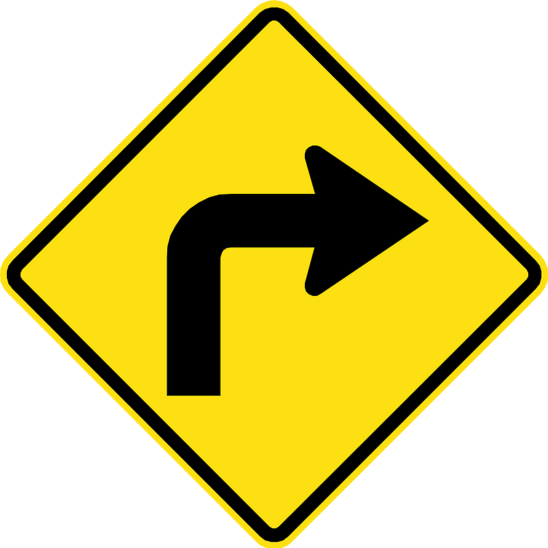 Sharp curve ahead sign in Chile