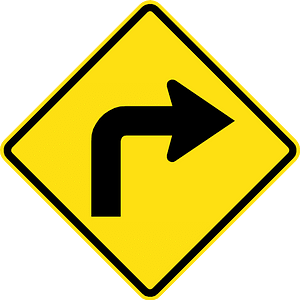 Sharp curve ahead sign in Chile