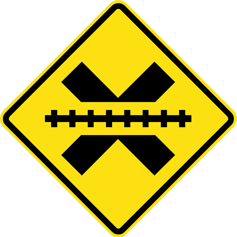 Uncontrolled railroad crossing ahead sign in Chile