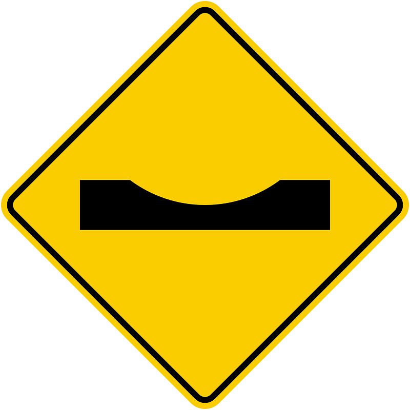 Dip in road sign in Colombia