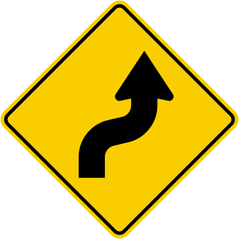 Double gentle curve ahead sign in Colombia