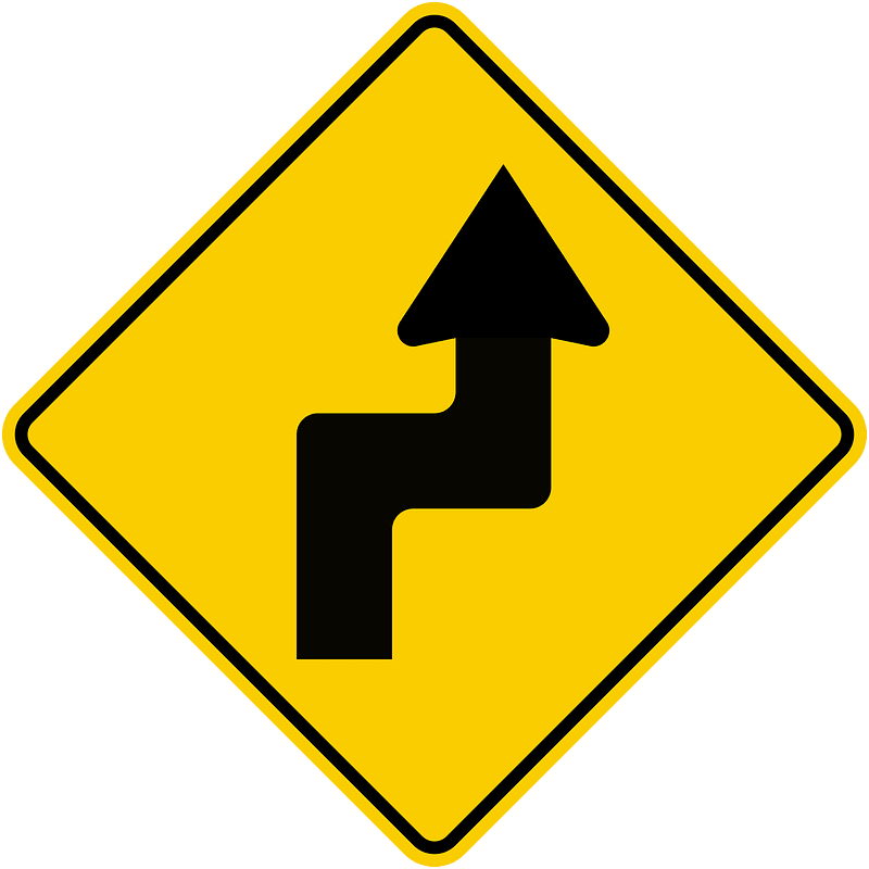 Double sharp curve ahead sign in Colombia