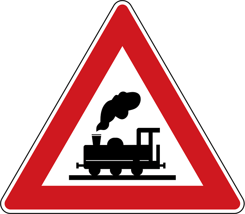 Level crossing without barriers ahead sign in Czech Republic