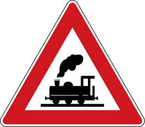 Level crossing without barriers ahead sign in Czech Republic