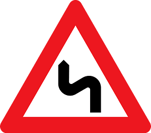 Double bend ahead sign in Denmark