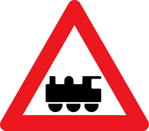 Level crossing without barriers ahead sign in Denmark