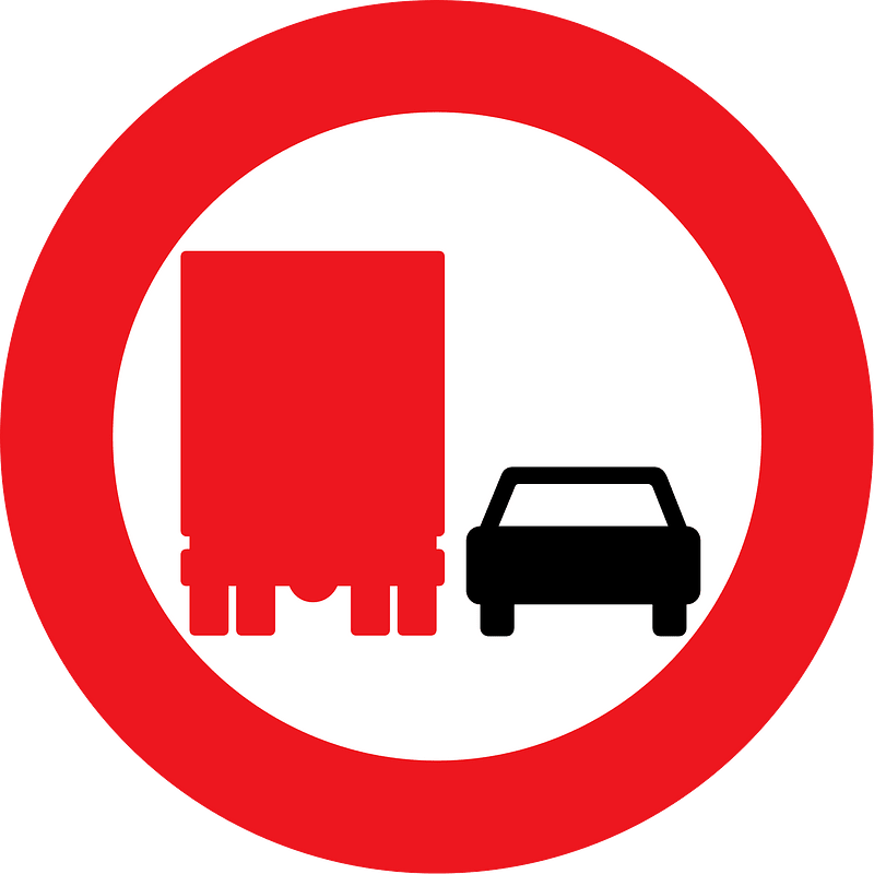 No overtaking by heavy goods vehicles sign in Denmark