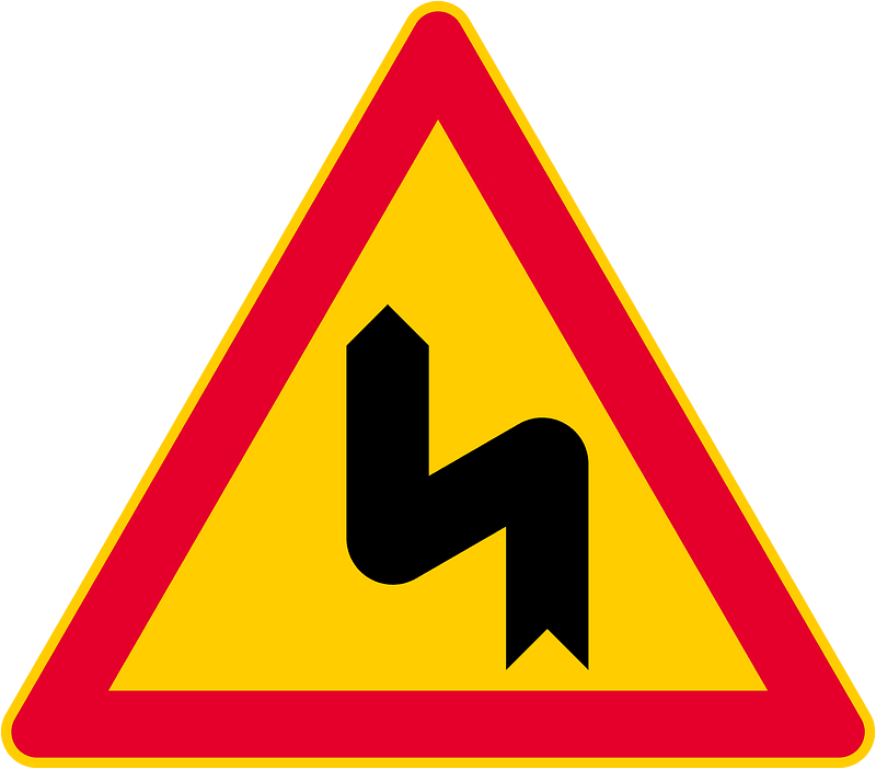 Double bend ahead sign in Finland