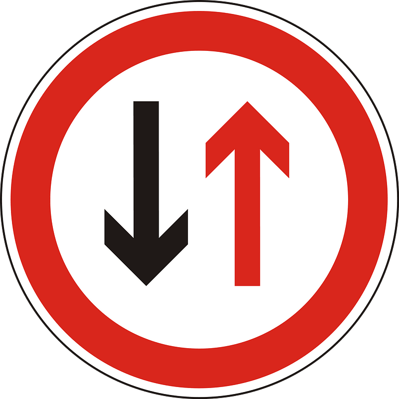 Give way to oncoming traffic sign in Hungary