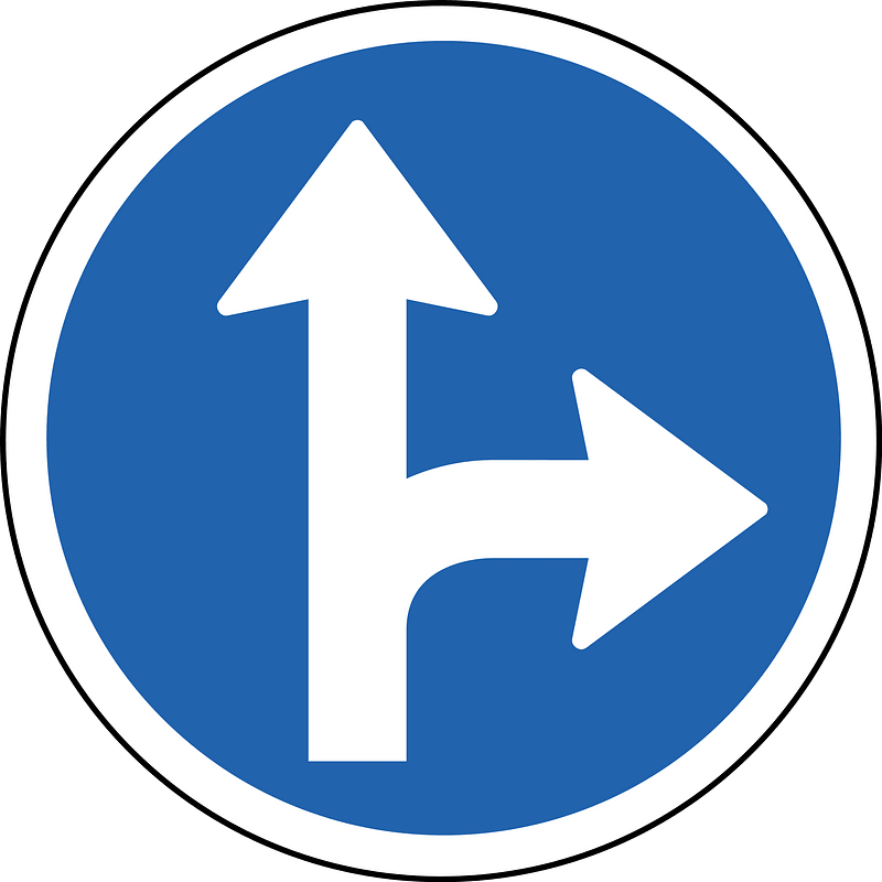 Proceed straight or turn right only sign in Iceland