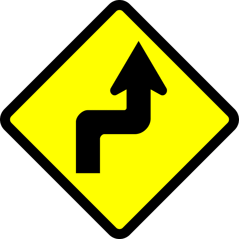 Double sharp curve ahead sign in Indonesia
