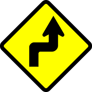 Double sharp curve ahead sign in Indonesia