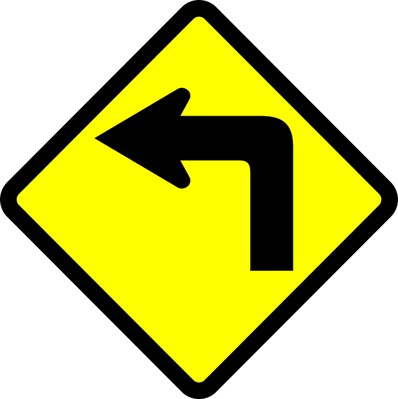 Sharp curve ahead sign in Indonesia