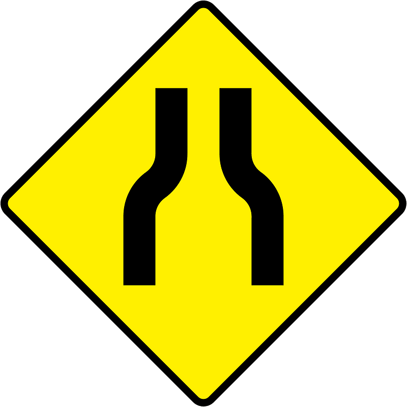 Road narrows ahead sign in Ireland