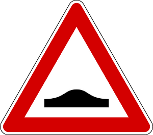 Road hump ahead sign in Italy
