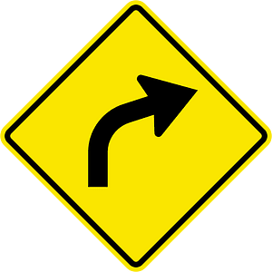 Gentle curve ahead sign in Jamaica
