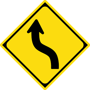 Double gentle curve ahead sign in Japan