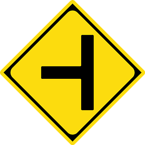Junction with a side road ahead sign in Japan