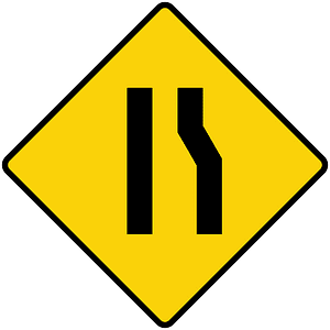 Lane ends ahead sign in Liberia