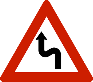 Double bend ahead sign in Norway