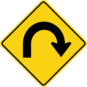 Hairpin curve ahead sign in Ontario