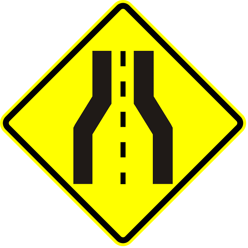 Road narrows ahead sign in Panama