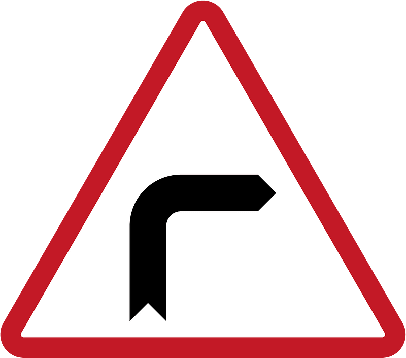 Sharp curve ahead sign in Philippines