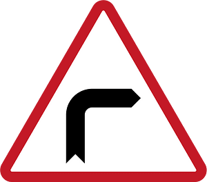 Sharp curve ahead sign in Philippines
