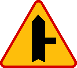 Junction with a minor road sign in Poland