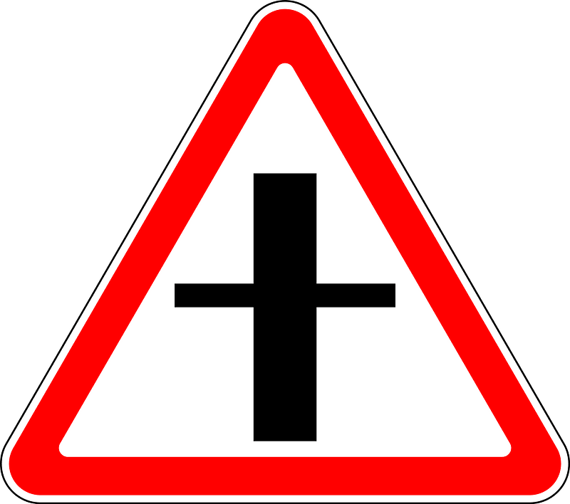 Crossroads with a minor road sign in Russia