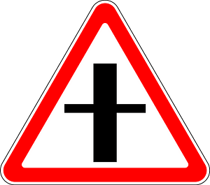 Crossroads with a minor road sign in Russia