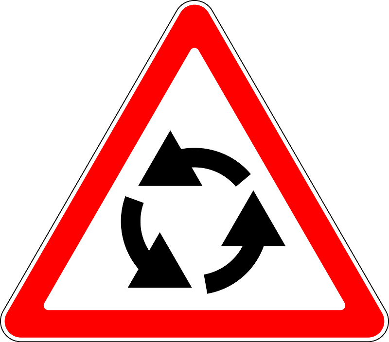 Roundabout ahead sign in Russia