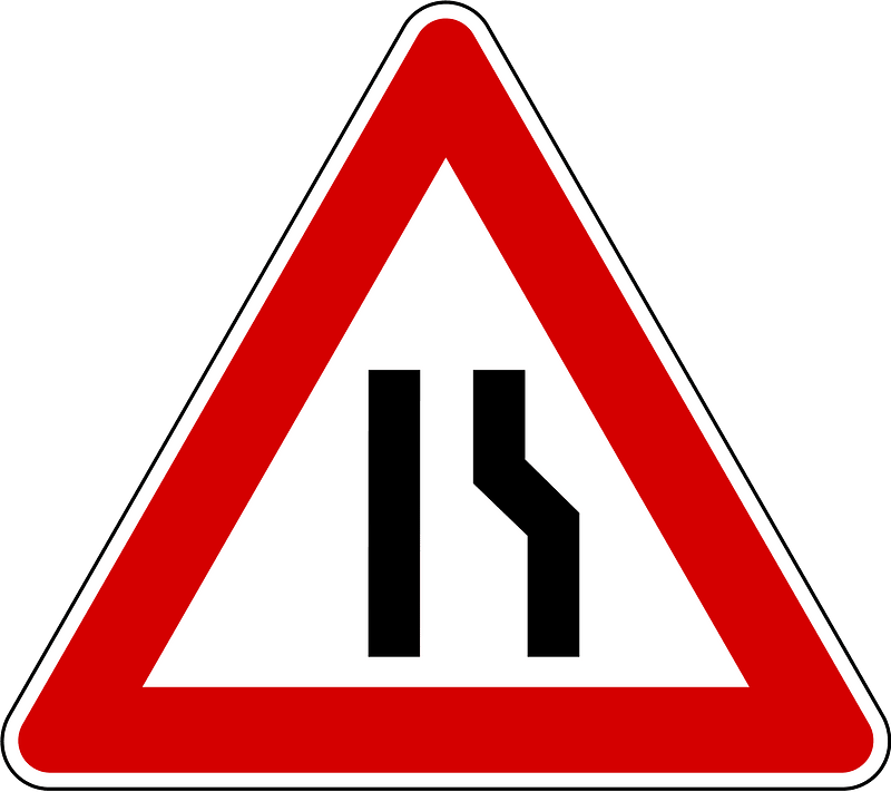 Road narrows on one side sign in Slovenia